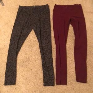 1 black and gray tights. 1 burgundy tights.